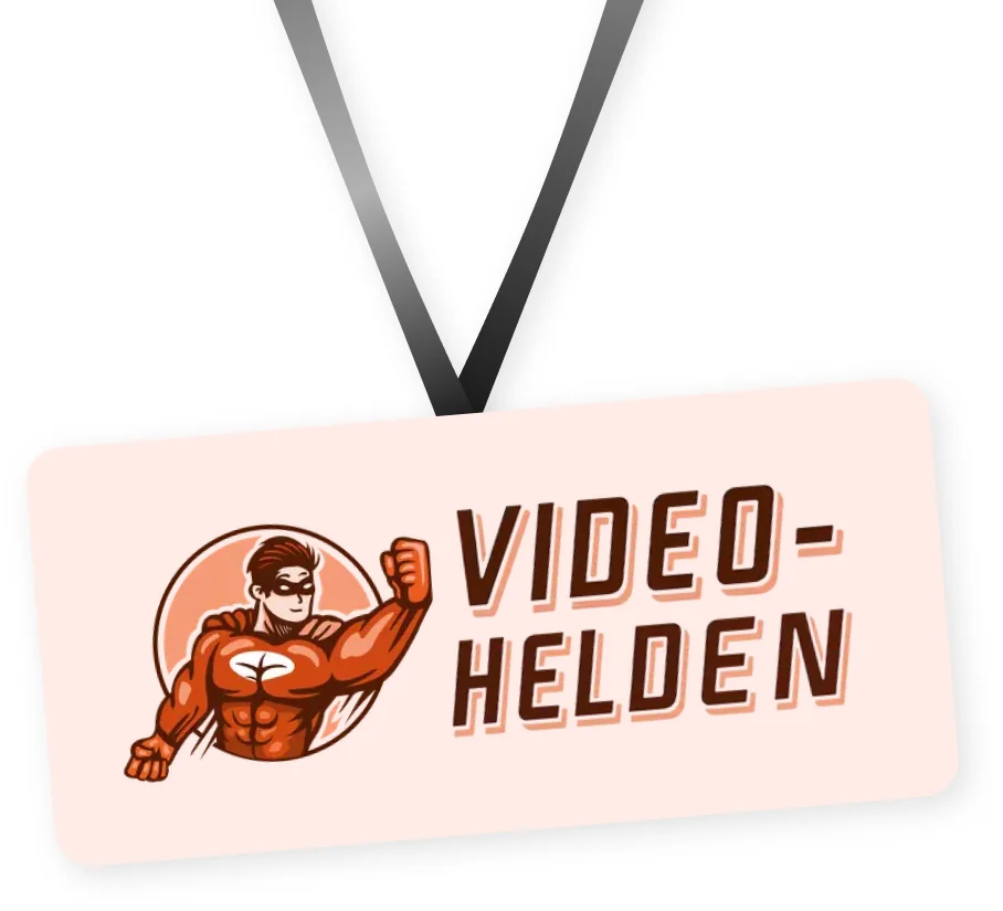 A Video Helden badge hanging from a black lanyard